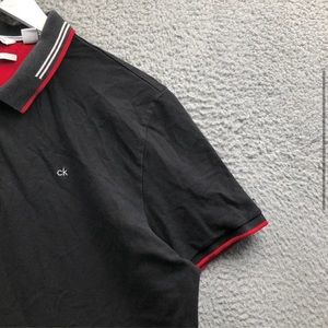 CALVIN KLEIN collared shirt. Black with red accents. Medium. Embroidered logo